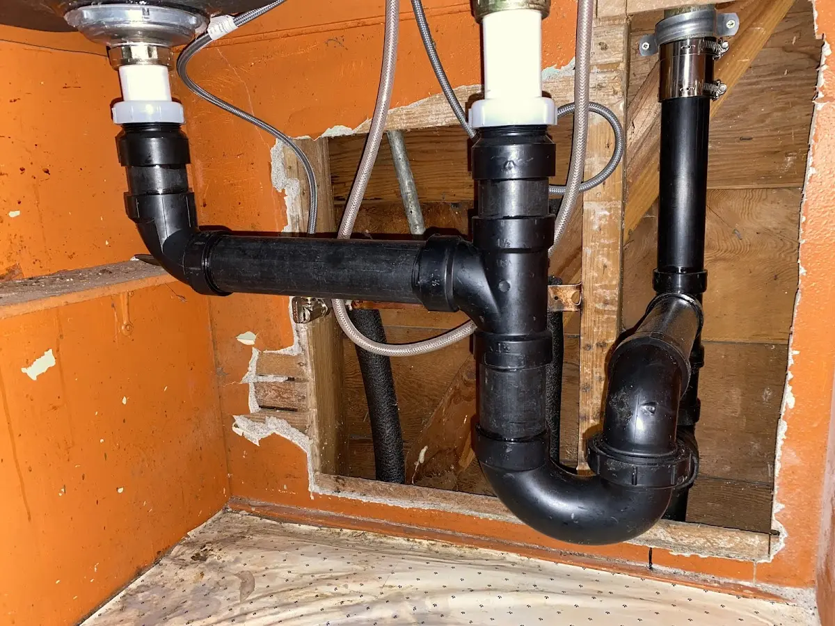 Professional Garbage Disposal Repair equipment and tools on the job in Dillon